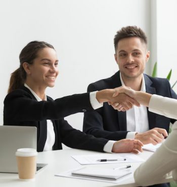 hr-representatives-positively-greeting-female-job-candidate_1163-4702